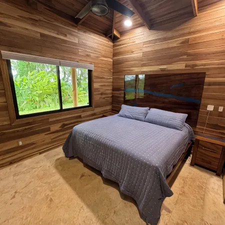 Nestled at the base of Rincon de la Vieja Volcano and bordering the Rio Celeste.