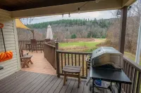 Village Home with 15 acre backyard on the river