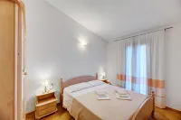 The Fantastic Residenza Badus 1 Bedroom Apartment  B4 Sleeps 4