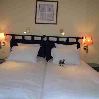 Logis Hôtel le Cheval Blanc Rooms