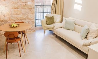 Gabriel Apartments - Stone Suits Jem City Center