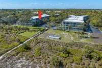 Ocean View Balcony and Community Pool - Charming Island Escape