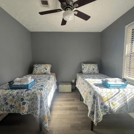 Spacious 4-bedroom house in Columbus with privacy fence situated in the county!