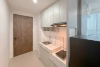 Combined Grey Toned 2BR Apartment at The City Square Surabaya By Travelio - Lejligheder