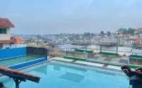 Rumah Syariah dan Kolam Renang Bugenville - Guest houses