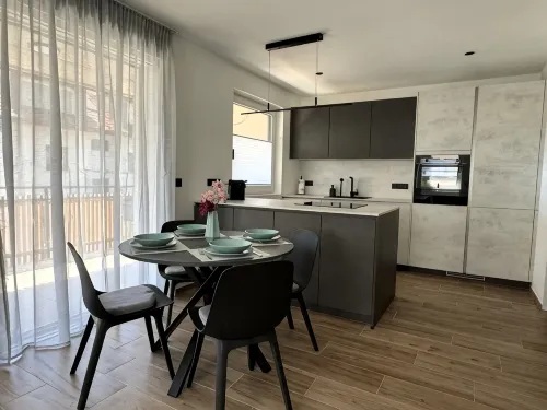 Modern apartment with large balcony. Near city center. - Kitchens