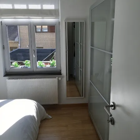 Modern duplex apartment, ground floor with garden within walking distance of the sea