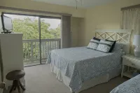 Steps to#1 Rated Beach in USA Spacious2+2Condo,Pool,GarageTranquil Setting - balcony