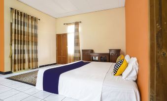 OYO Homes 90914 Eco Tourism Desa Cipada Bukit Senyum Homestay Syariah - Housity