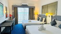Rainbow Paradise Seaview by Achlys Collection - bar