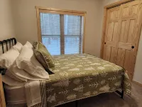 Spacious 5-BR home in Manitowish Waters with pier access on Chain of Lakes.