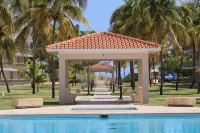 Charming Beachfront Retreat - Wake Up to Waves - 2 BD Apt with AC at Río Grande - 3-Star