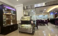 Daima Hotel Padang - พร้อมอาหารเช้า