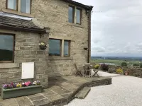 Law Brook Farm cottage with stunning views .
