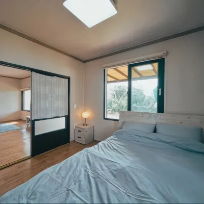Seogwipo Sky Stay Pension Отели рядом с достопримечательностью «Атлетический парк Сусан»