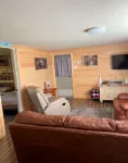 Cozy 2-bedroom cabin near endless trails. Family and pet friendly. Fire pit & AC
