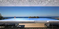 雅典都喜套房酒店 - 沙灘