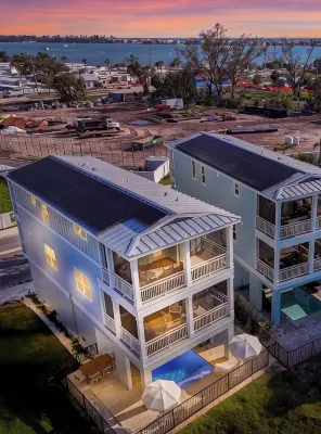 Coastal Luxe Villa! Tranquil 3-Story Retreat with Bay Views near Anna Maria Isl