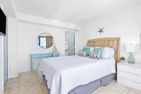 Stylish Oceanfront Condo - Huge Balcony - 3 Pools, Lazy River, and Hot Tub - Private Pools