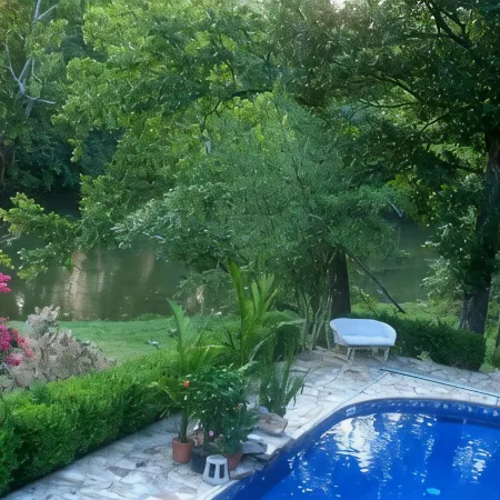 Riverfront, golf course retreat with pool!