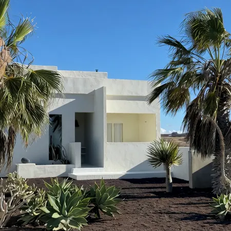 An architectural oasis with large swimming pool, along a breath-taking scenery.
