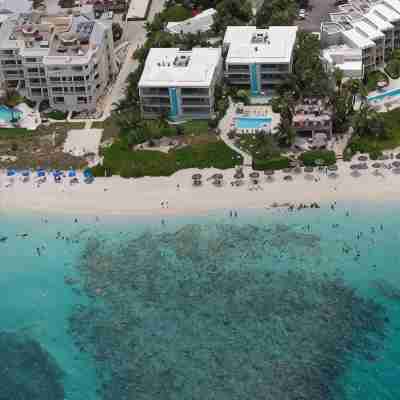 Grace Bay Beachfront:Tropical Reef 50 Feet Offshore. Hotel Exterior