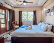 Spacious 5-bedroom Panglao Home with FREE transfers, Infinity Pool, WiFi, & A/C - 2-Star