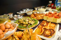 Komilfo Hotel - พร้อมอาหารเช้า