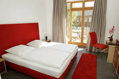 Hotel am Hof Отели в г. Тауфкирхен