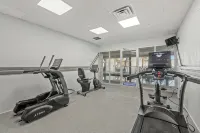 Serenity By The Sea: Modern Beachfront Condo with Stunning Views - Gym