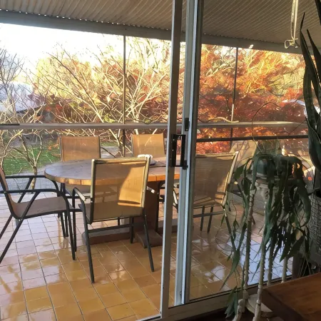 Tree Tops Apt @ Dreamers features log fire, mountain + pool views thru tree tops