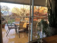 Tree Tops Apt @ Dreamers features log fire, mountain + pool views thru tree tops - Apartments