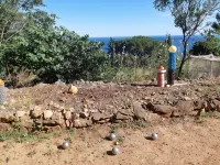 Top of villa, terraces, swimming pool at Mont St Clair, pétanque court with sea view
