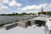 Houseboat Fjord Serina with bio-sauna and roof terrace in Schleswig