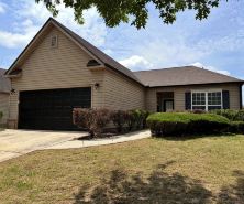 Charming 3-bedroom house in small-town Byron with WiFi, AC, and patio seating.