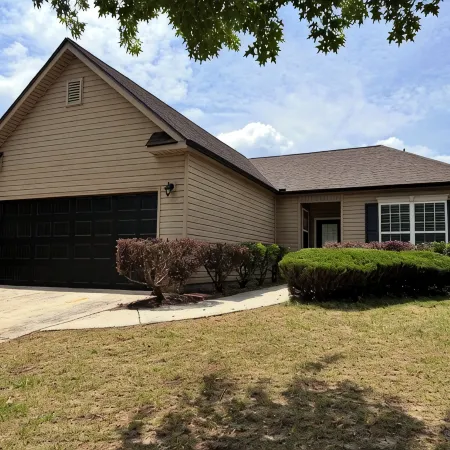 Charming 3-bedroom house in small-town Byron with WiFi, AC, and patio seating.