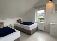 Prachtig Designhuis, Rustige Ligging, Zwembad, Speeltuin, Fietsen in de Duinen - プール