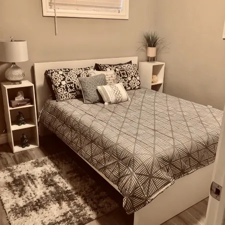 Cozy 2 bedroom basement with 2 beds, kitchen, 75’’ TV and bathroom