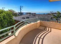 Sun filled home a short walk to the beach, school, shops and restaurants.