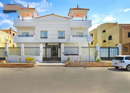 Al Manzel Sheikh Zayed Отели рядом с достопримечательностью «Миср Юниверсити фор Сайенс & Текнолоджи»