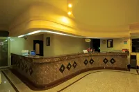 Side Palm d'or Hotel