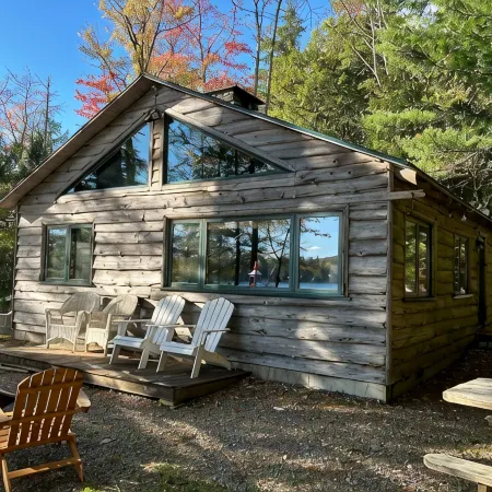 Welcoming 4-bedroom lake front cabin in charming Otis on Beech Hill Pond.