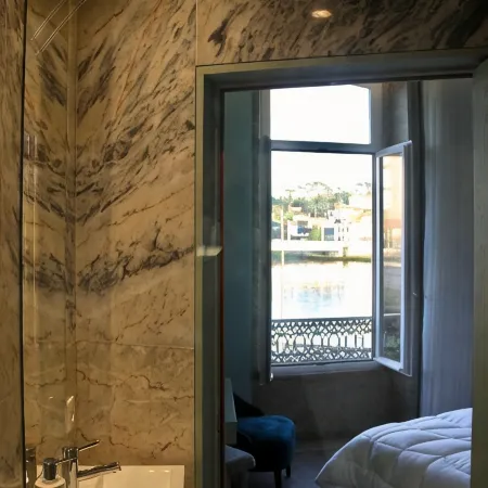 A Rendilheira Charm Suites