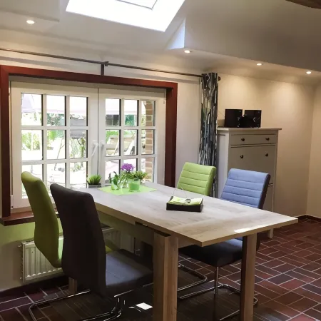 Vacation apartment "Kaminzimmer" in the 2-stall country house in the Rhodo garden.