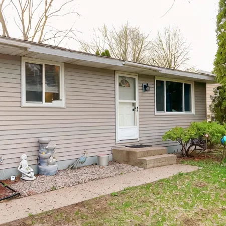 Fantastic Oasis Home in Stevens Point with fully enclosed fence for backyard!