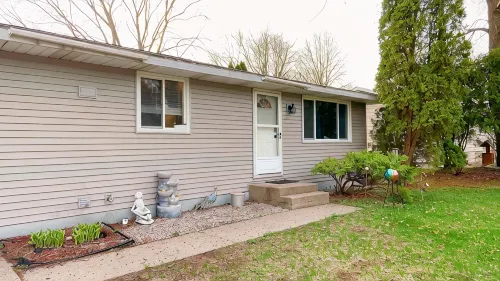 Fantastic Oasis Home in Stevens Point with fully enclosed fence for backyard!