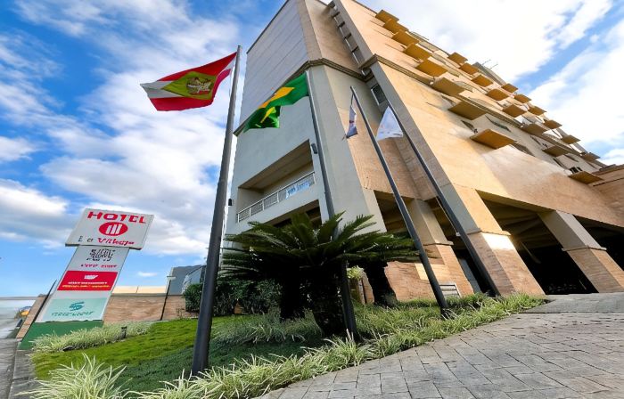 Le Village Flats e Hotel