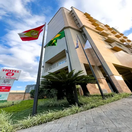 Le Village Flats e Hotel