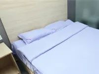 Baicheng Aige Fashion Hotel - parking