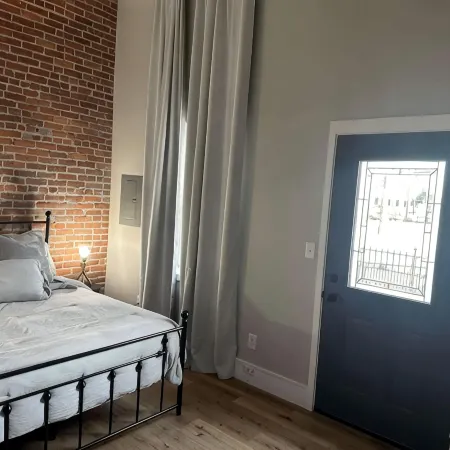 Stylish & Modern 2-Bdrm Apt in Downtown Warsaw featuring an urban rooftop deck.